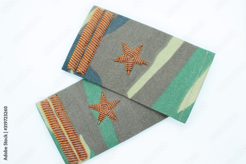 Green camouflaged sleons located on a white background Green camouflaged sleons located on a white background