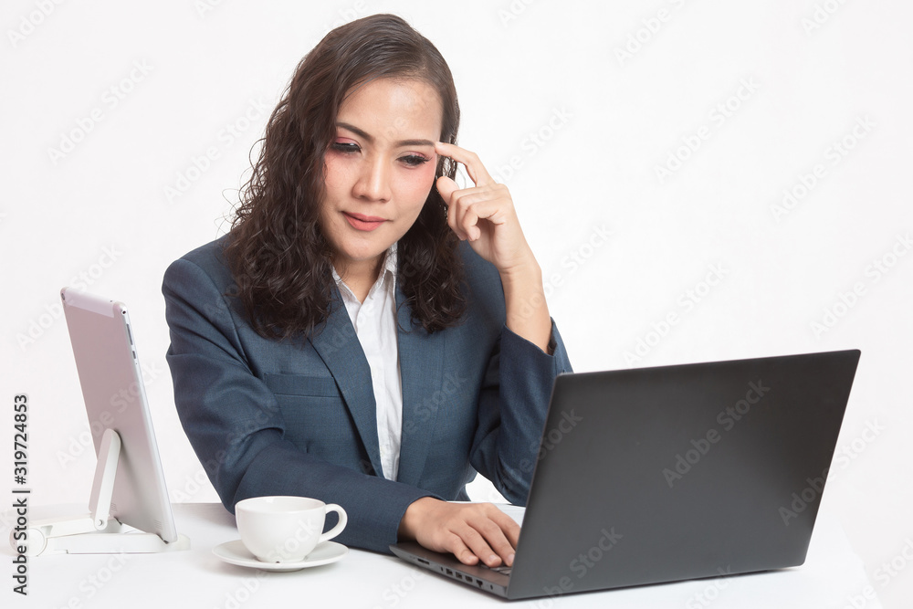 Beautiful young executive with her work and coffee