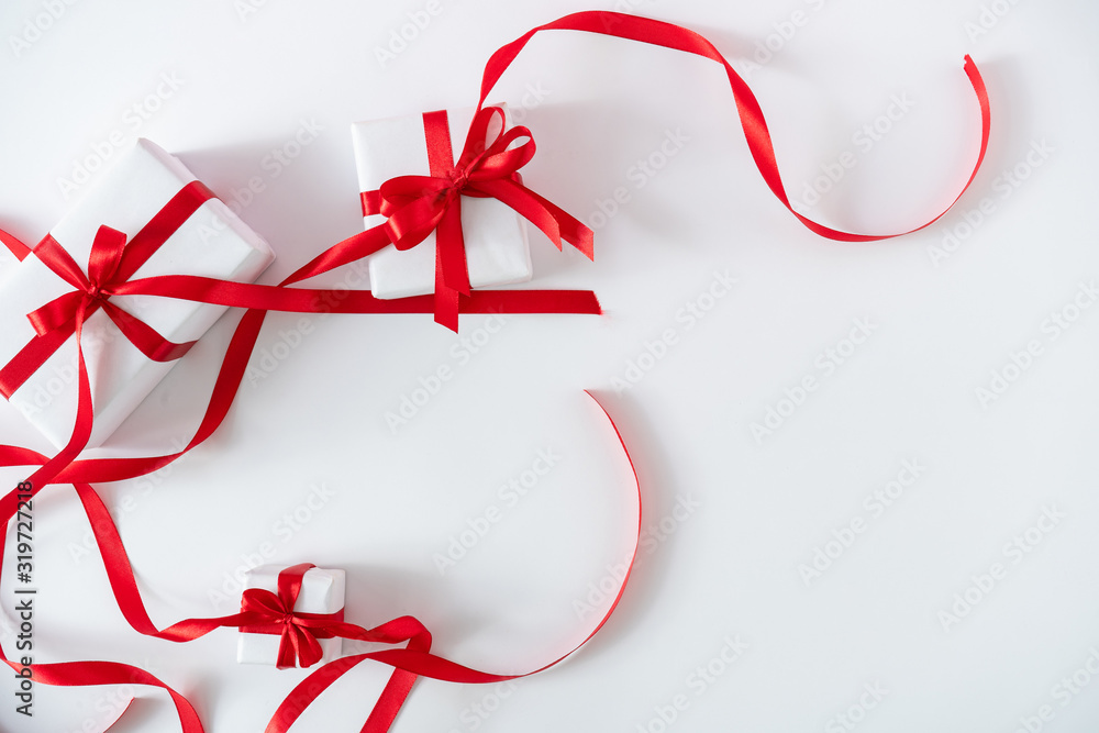 Christmas and New Year holiday background with gift boxes. Bright Xmas greeting card. Christmas decoration. Noel. Top view. Flat lay. Christmas and New Year holiday background with gift boxes. Bright Xmas greeting card. Christmas decoration. Noel. Top view. Flat lay.
