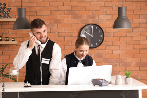 Male and female receptionis...