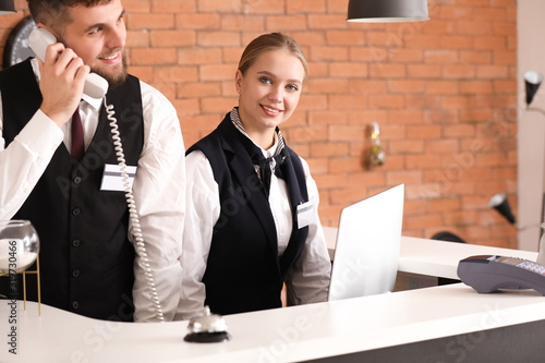 Male and female receptionis...