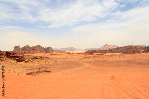 Wadi Rum desert panorama with dunes  mountains and sand  Jordan