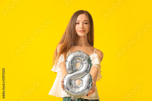 Beautiful young woman with ...