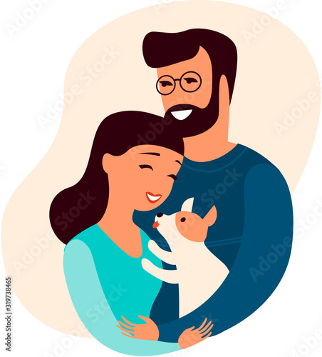 Young couple holding small puppy