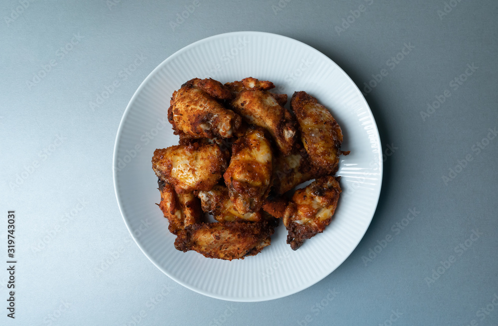 Delicious plate of hot and juicy buffalo chicken wings Delicious plate of hot and juicy buffalo chicken wings