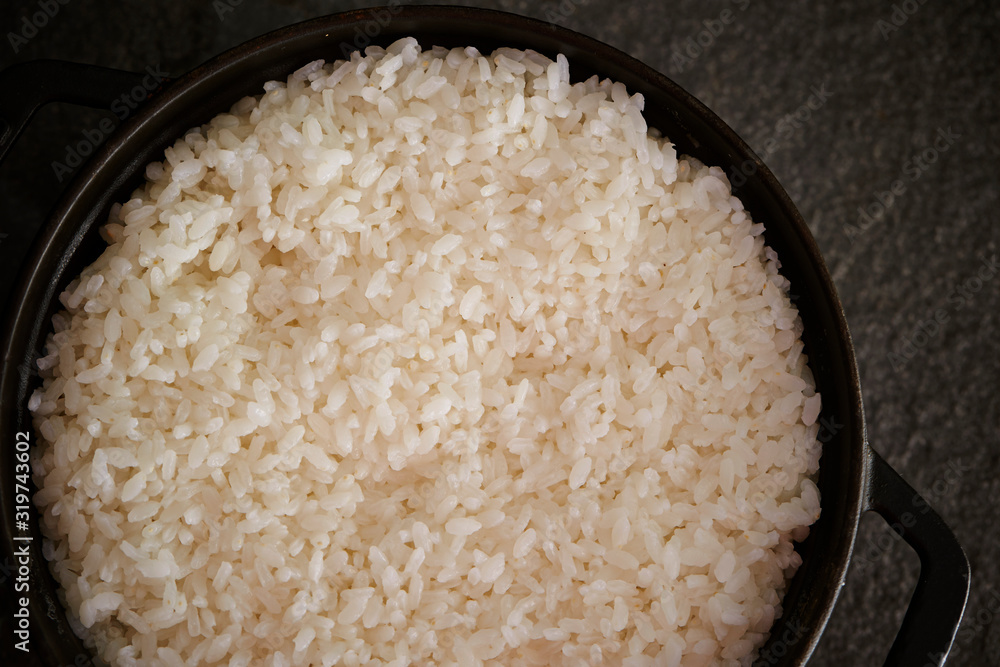 Steamed rice in iron pot Steamed rice in iron pot