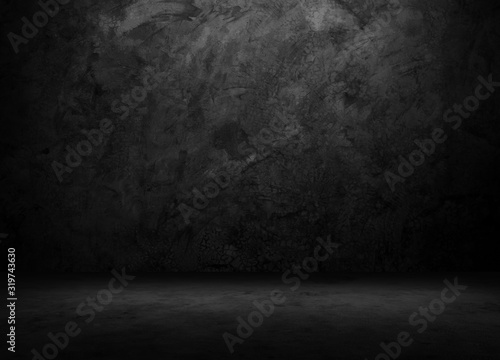 Black wall room background The surface of the brick dark jagged. Abstract black wall empty room background for interior design and decoration.