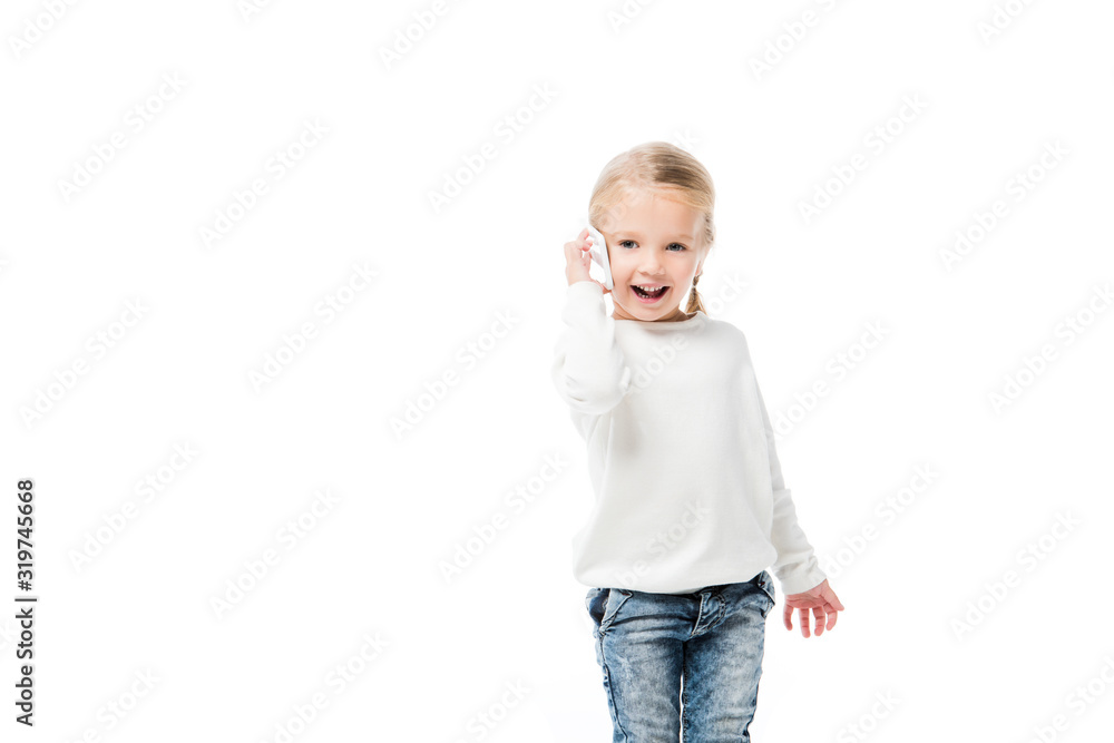 excited adorable kid talking on smartphone, isolated on white excited adorable kid talking on smartphone, isolated on white