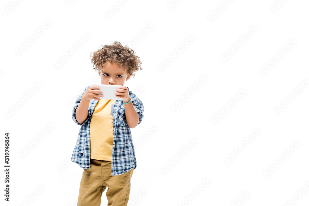 african american boy using smartphone, isolated on white african american boy using smartphone, isolated on white