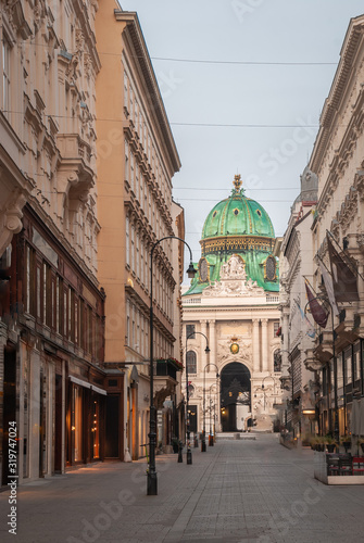 Photography Kohlmarkt street with Hofburg Complex in early morning in downtown of Vienna in