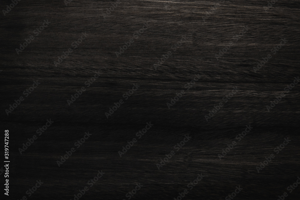 Black wood texture background coming from natural tree. Abstract dark wooden panel with beautiful patterns.Background for interior design. Black wood texture background coming from natural tree. Abstract dark wooden panel with beautiful patterns.Background for interior design.