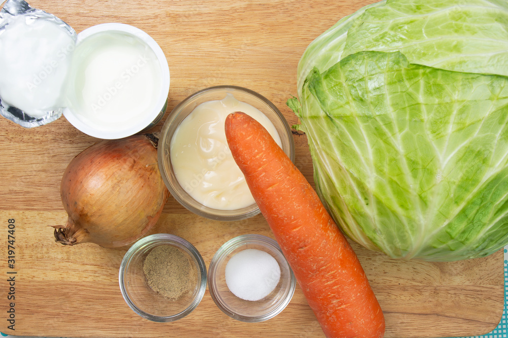 Cabbage, onions, carrots, Salad cream, Salt,Pepper and Yoghurt for cook Coleslaw