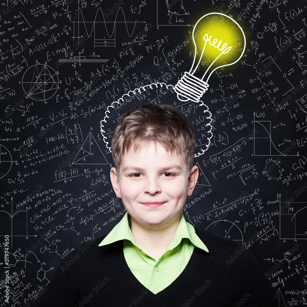 Child boy with lightbulb. Concept Ideas and projects
