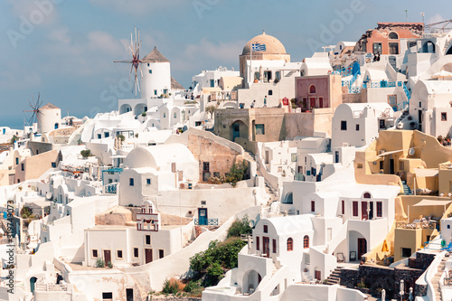 Classical casual view on the decoration and architecture of Oia village Santorini at sun weather © STUDIO MELANGE