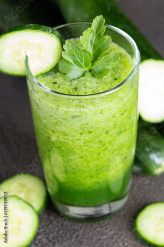Glass of fresh cucumber juice. Green smoothie. Detox water. Healthy drink.