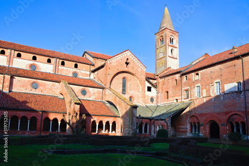 Staffarda  Piedmont  Italy - January 20  2020  View of the cloister and internal court of the Staffarda abbey  a Cistercian monastery located near Saluzzo  founded in 1135
