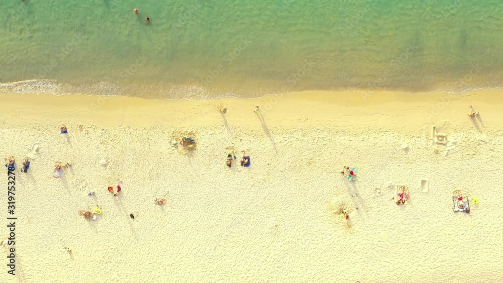 Beautiful water on Kata Noi beach. Drone 4K View of Kata Noi Beach, Phuket, Thailand. Aerial people one the beach Beautiful water on Kata Noi beach. Drone 4K View of Kata Noi Beach, Phuket, Thailand. Aerial people one the beach