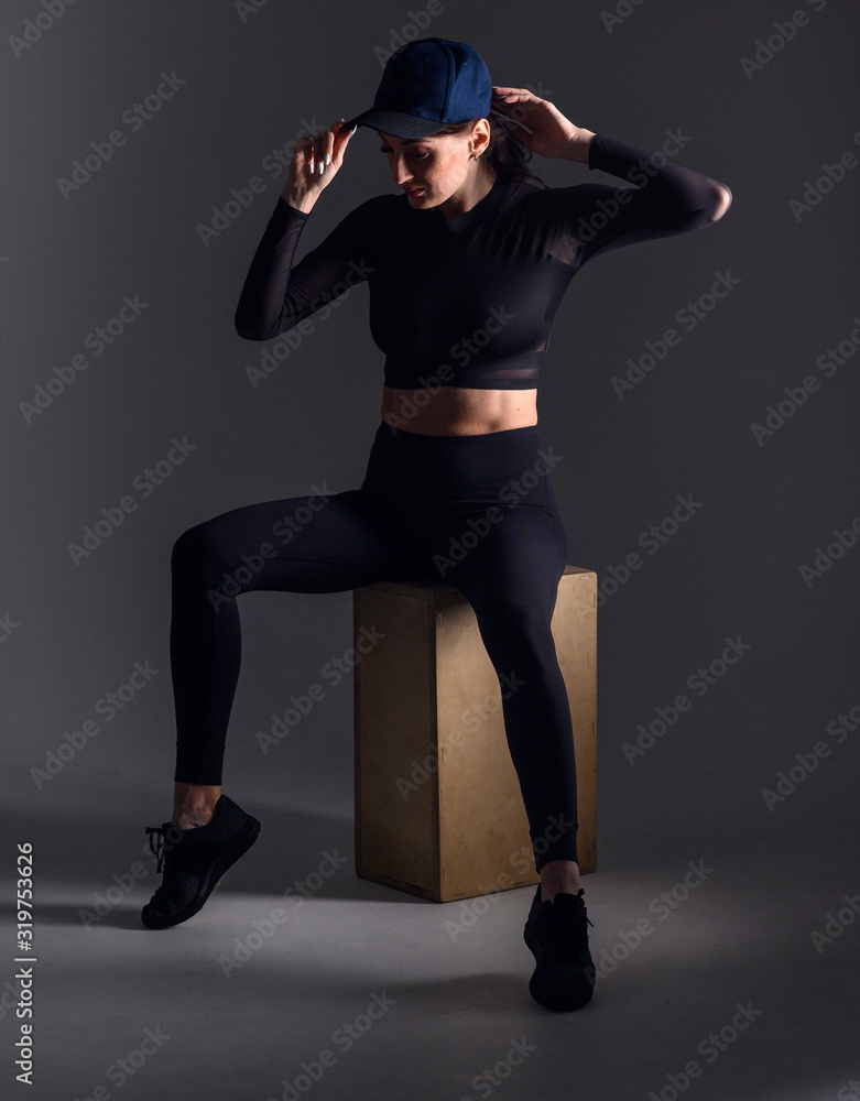 Sport concept. A strong athletic, women sprinter, wearing in the sportswear, fitness and sport motivation