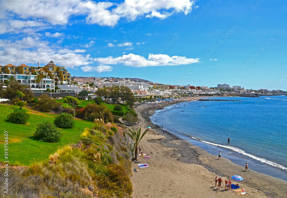 Beautiful view of Fanabe beach in Costa Adeje, Tenerife,Canary Islands,Spain.Summer vacation,relax or travel concept.Selective focus.