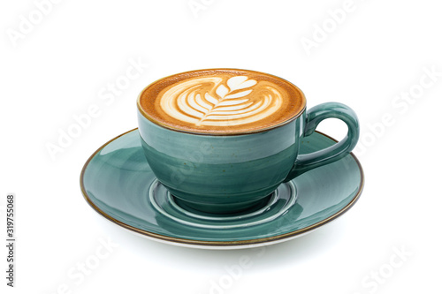 Side view of hot latte coffee with latte art in a vintage ceramic green cup and saucer isolated on white background with clipping path inside. Image stacking techniques.