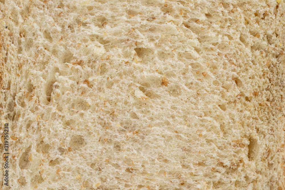 Close-up of healthy whole wheat bread for background texture.