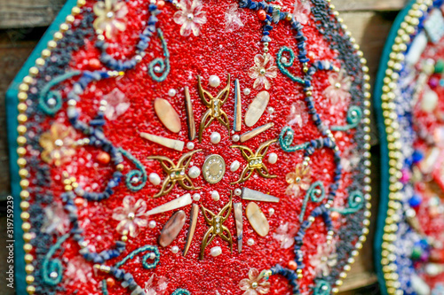 Decorative patterns and ornaments of the peoples of the world close up.