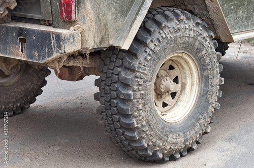dirty old wheels and off-road suspension close-up