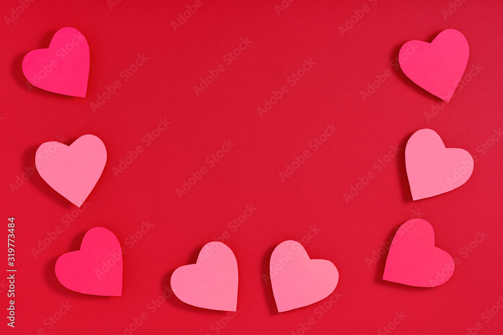 Valentine hearts on red surface. Top view, flat lay, from above, copy space Valentine hearts on red surface. Top view, flat lay, from above, copy space