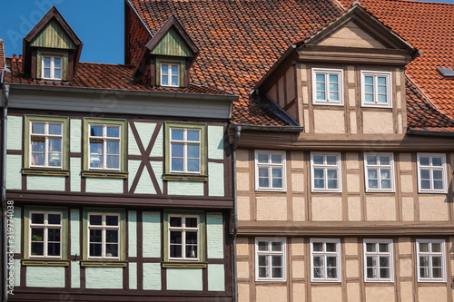 Front view of the facade of a traditional half-timbered house. An example of Fachwerk in the medieval city of Quedlinburg, Saxony-Anhalt, Germany. 