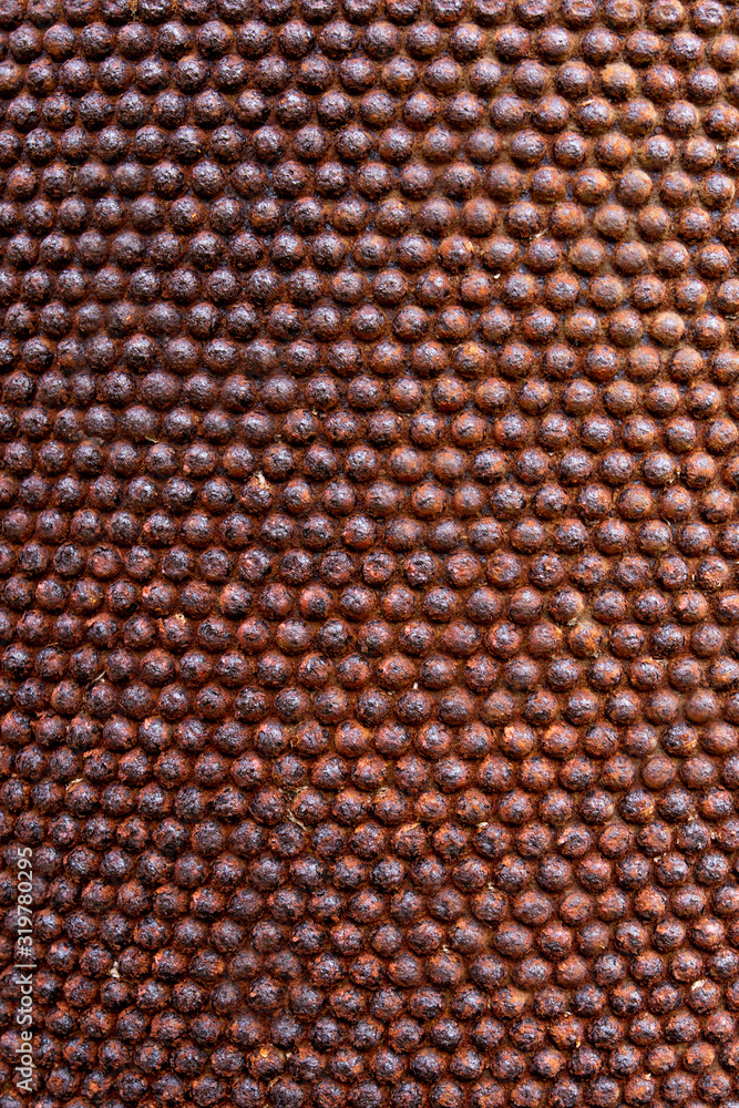 Old rusty metal, texture and background, metal with convex round balls in rows. Old rusty metal, texture and background, metal with convex round balls in rows.