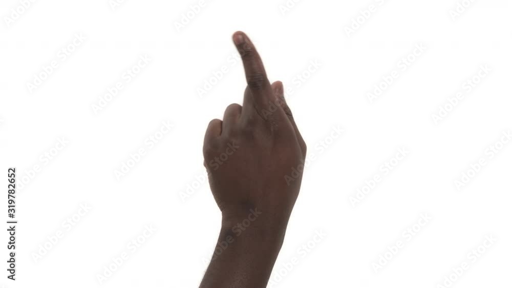 Back view of a man pointing at virtual objects with index finger Back view of a man pointing at virtual objects with index finger