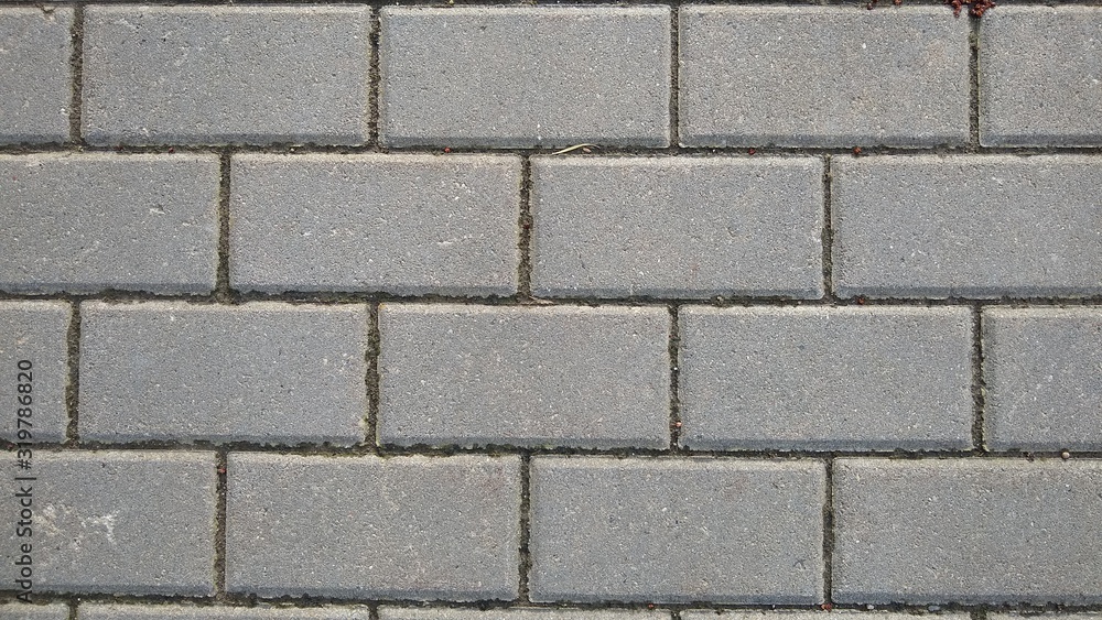 Paving stone texture - Concrete or cobble gray pavement slabs or stones for floor Paving stone texture - Concrete or cobble gray pavement slabs or stones for floor