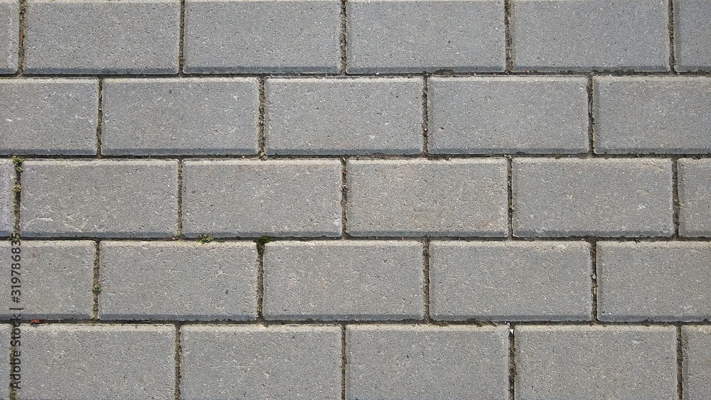 Paving stone texture - Concrete or cobble gray pavement slabs or stones for floor Paving stone texture - Concrete or cobble gray pavement slabs or stones for floor