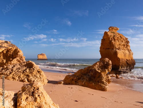Beautiful rocky beach praia da marinha near Carvoeiro at the coast of Algarve, Portugal. Wonderful landscape and seascape for tourism and travel and nature topics