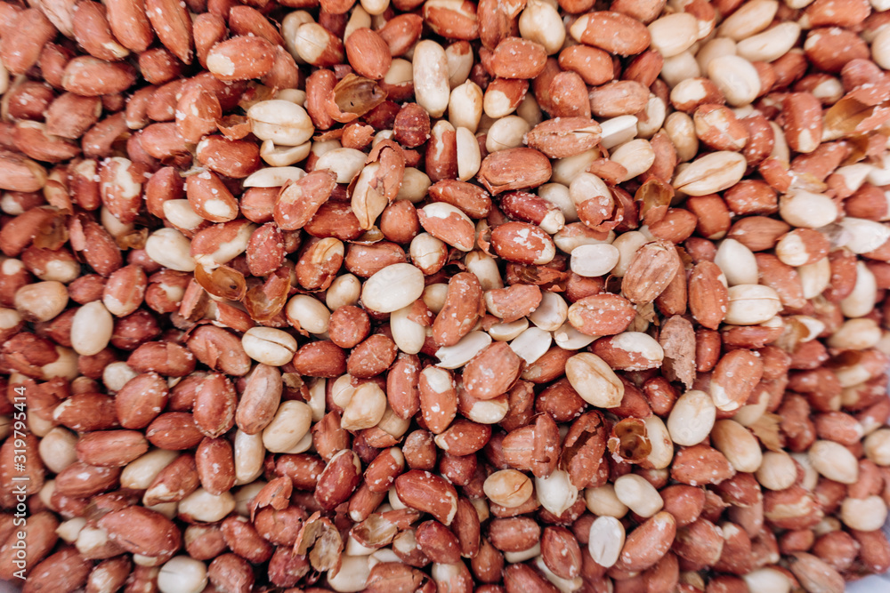 Closeup image of salted peanuts as a food background Closeup image of salted peanuts as a food background