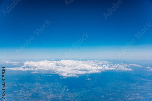 Fototapeta Naklejka Na Ścianę i Meble -  Clouds, a view from airplane window