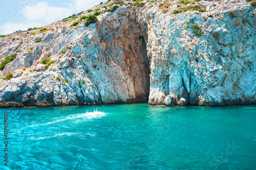 Fototapeta Naklejka Na Ścianę i Meble -  Seascape view to turquoise waters of Aegean Sea in Island Moni near Athens, blue caves.