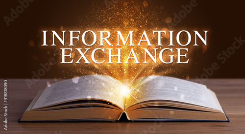 INFORMATION EXCHANGE inscription coming out from an open book, educational concept