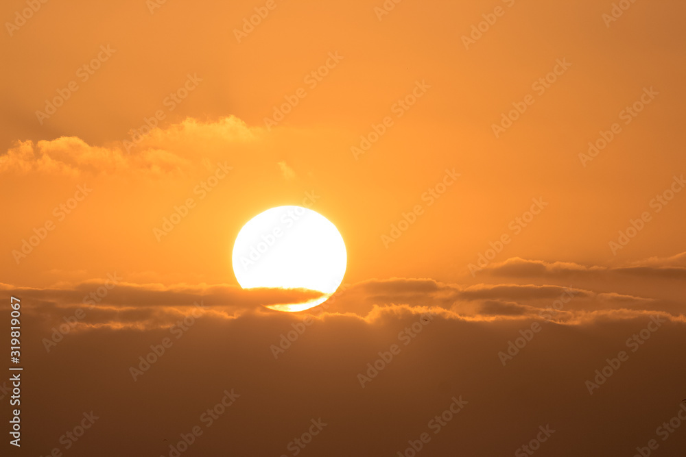 Obraz premium orange sun at the sunset