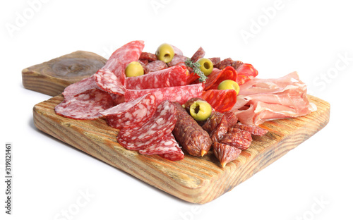 Wooden board with tasty prosciutto and other delicacies isolated on white