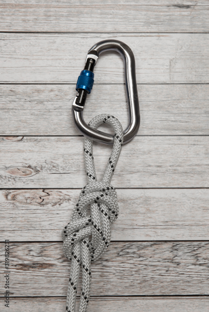 Double eight figure on a carabiner. Rock climbing knots