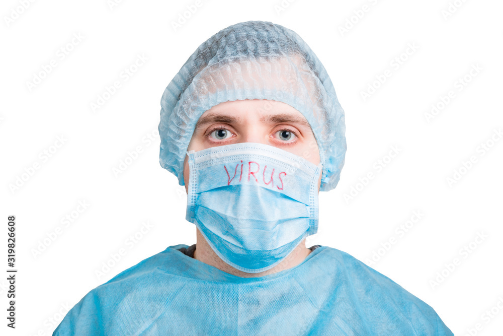 Portrait of handsome man wearing medical uniform and mask with virus word isolated on white background. Protect your health. Coronavirus concept Portrait of handsome man wearing medical uniform and mask with virus word isolated on white background. Protect your health. Coronavirus concept
