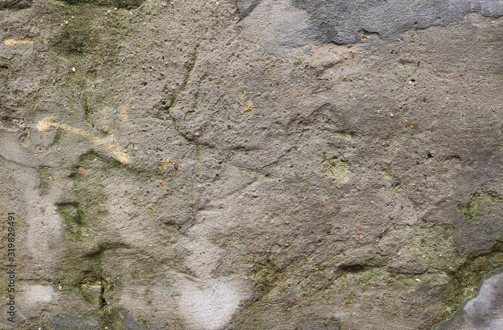 Obraz premium irregular rough surface of gray cement - weathered textured background