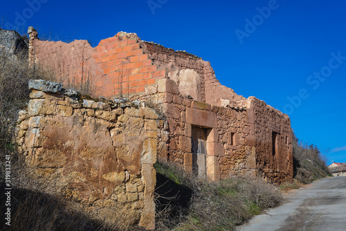 Ruined house in Penalba de San Esteban, small village in Soria region of Spain © Fotokon