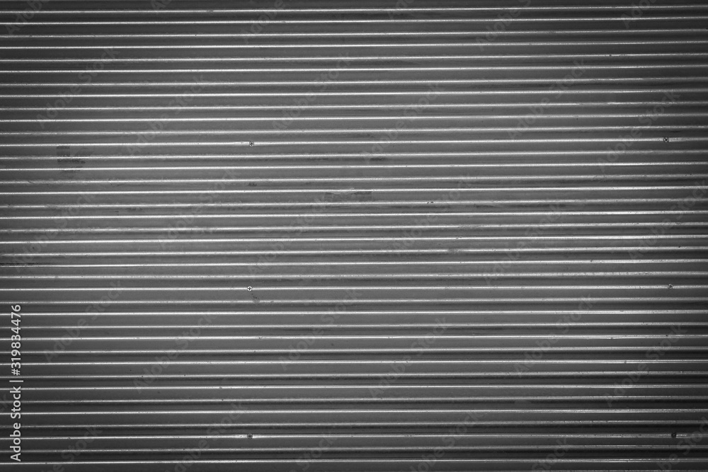 Metal texture pattern, ribbed cast iron surface, textured black background , wall for dark backdrop , loft style interior. Metal texture pattern, ribbed cast iron surface, textured black background , wall for dark backdrop , loft style interior.