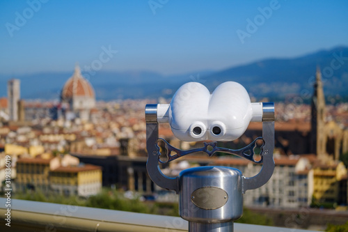 Binoculars on observation platform in old town