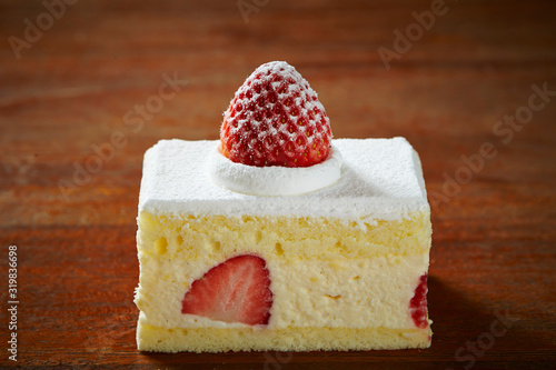 Valokuvatapetti Strawberry shortcake on wooden background