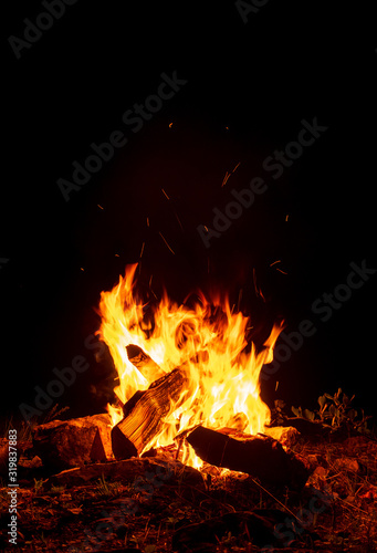 Campfire burning at dark night