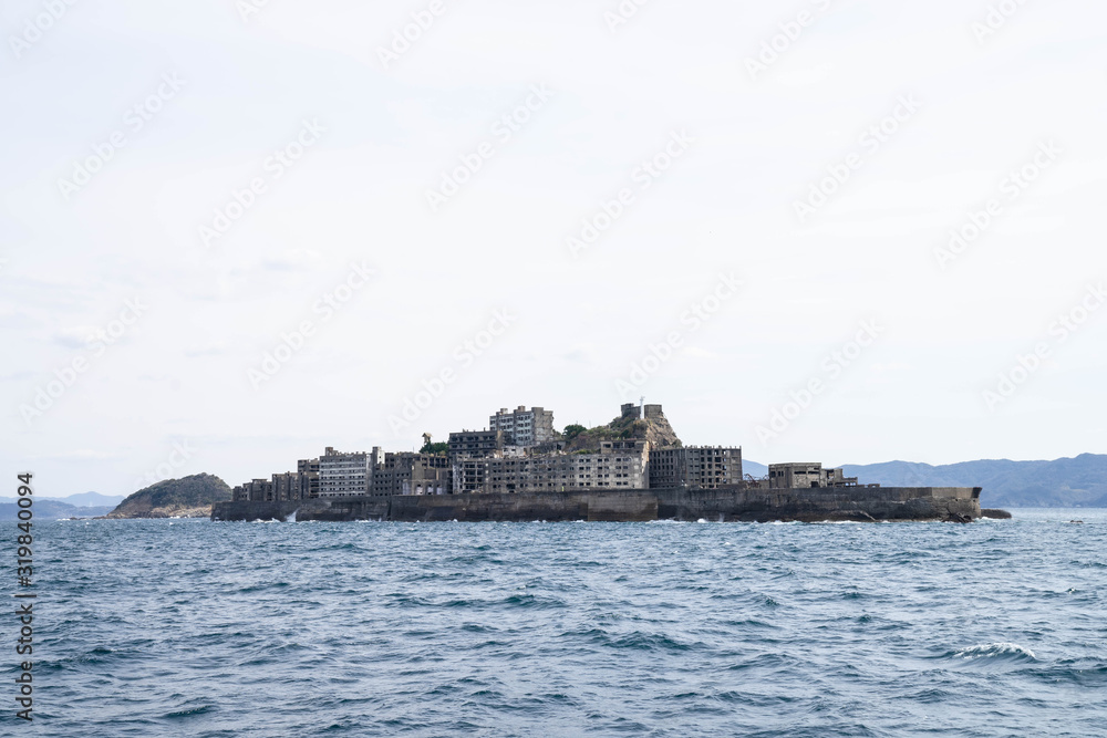 Hashima Island in Nagasaki, Japan. A symbol of the rapid industrialization of Japan. It is a UNESCO World Heritage site.