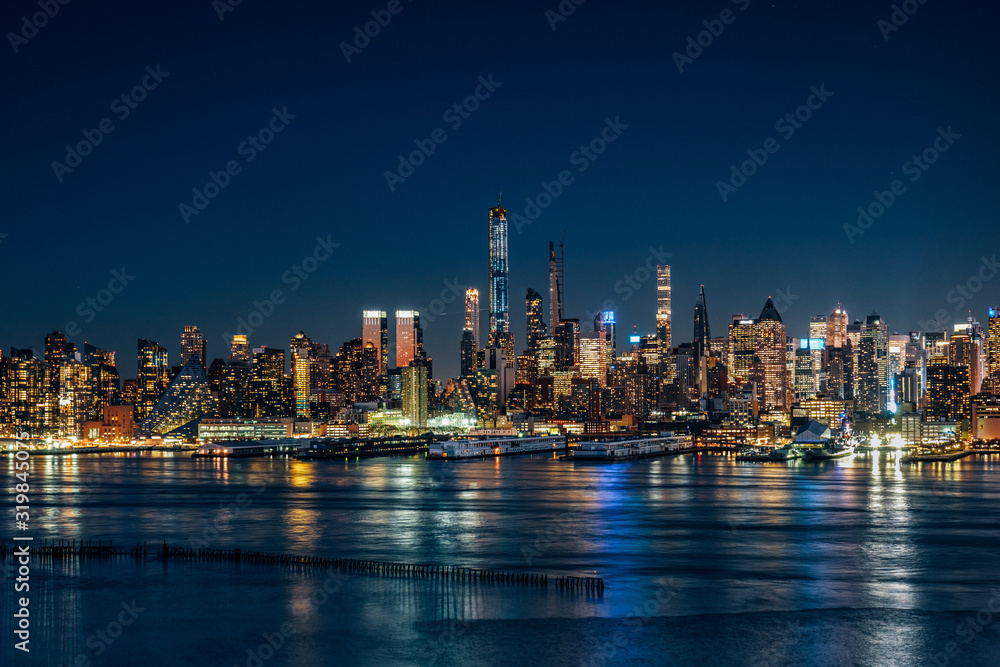 Night light at Hudson River West Midtown Manhattan Buildings